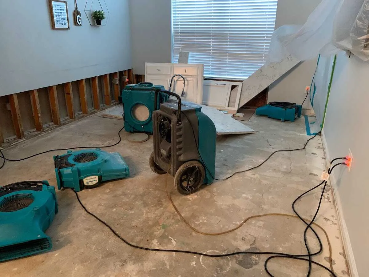 Dehumidifier in flood-cut room for Water Damage Restoration in Joplin